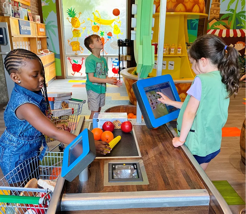 a group of kids at a grocery store
