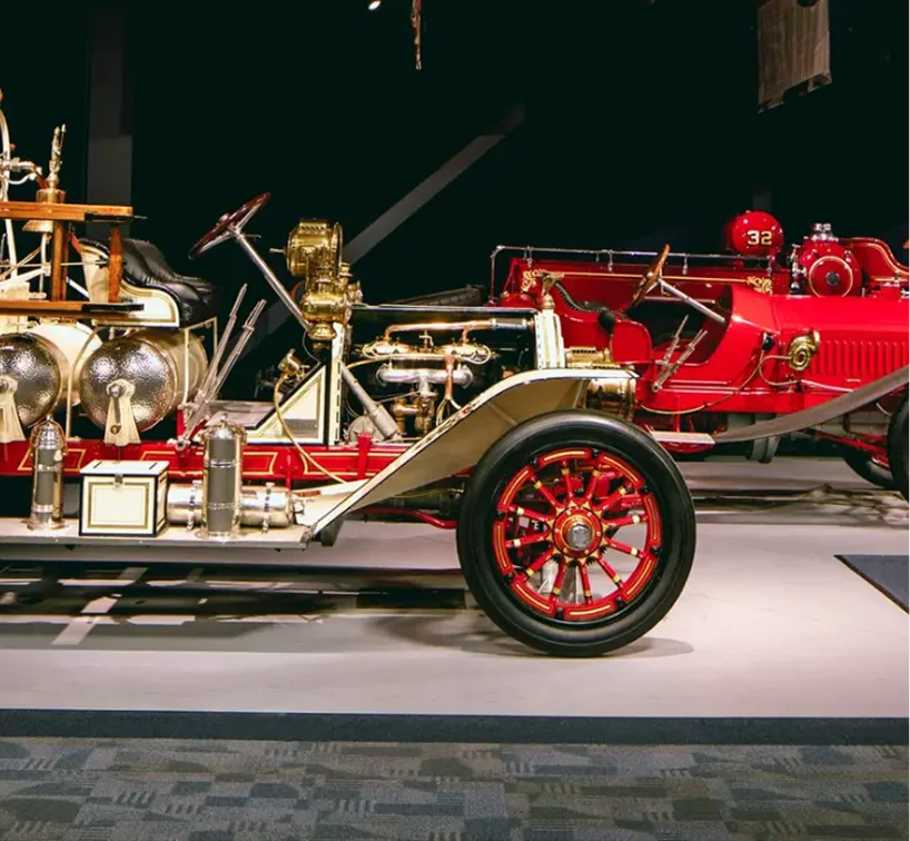 a red and gold antique car